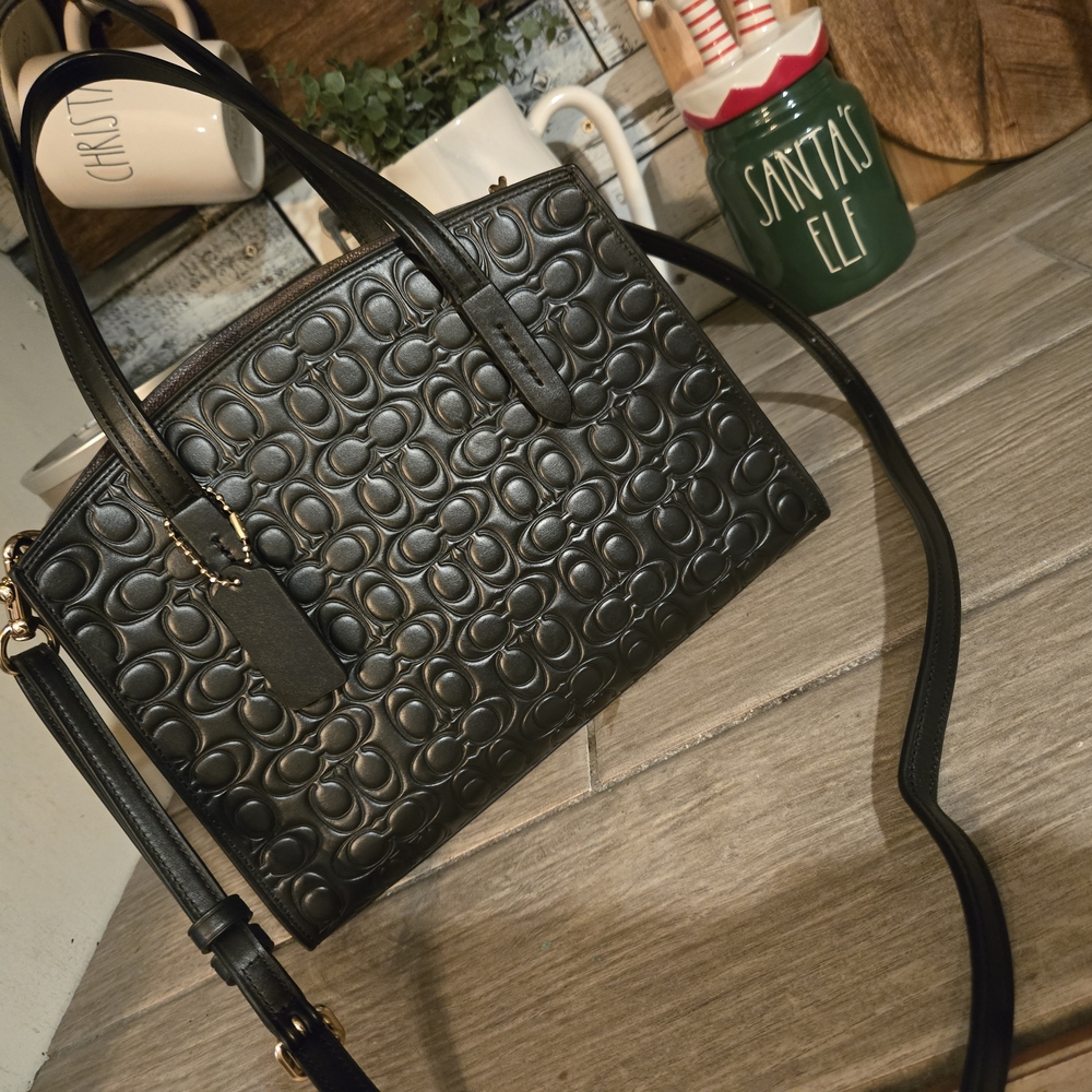 Black Crossbody Bag with Quilted Pattern and Adjustable Strap